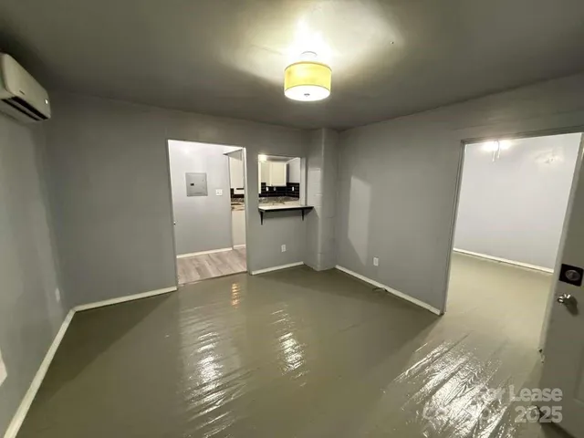 a view of a kitchen with a sink cabinets and a window