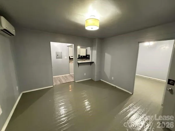 a view of a kitchen with a sink cabinets and a window