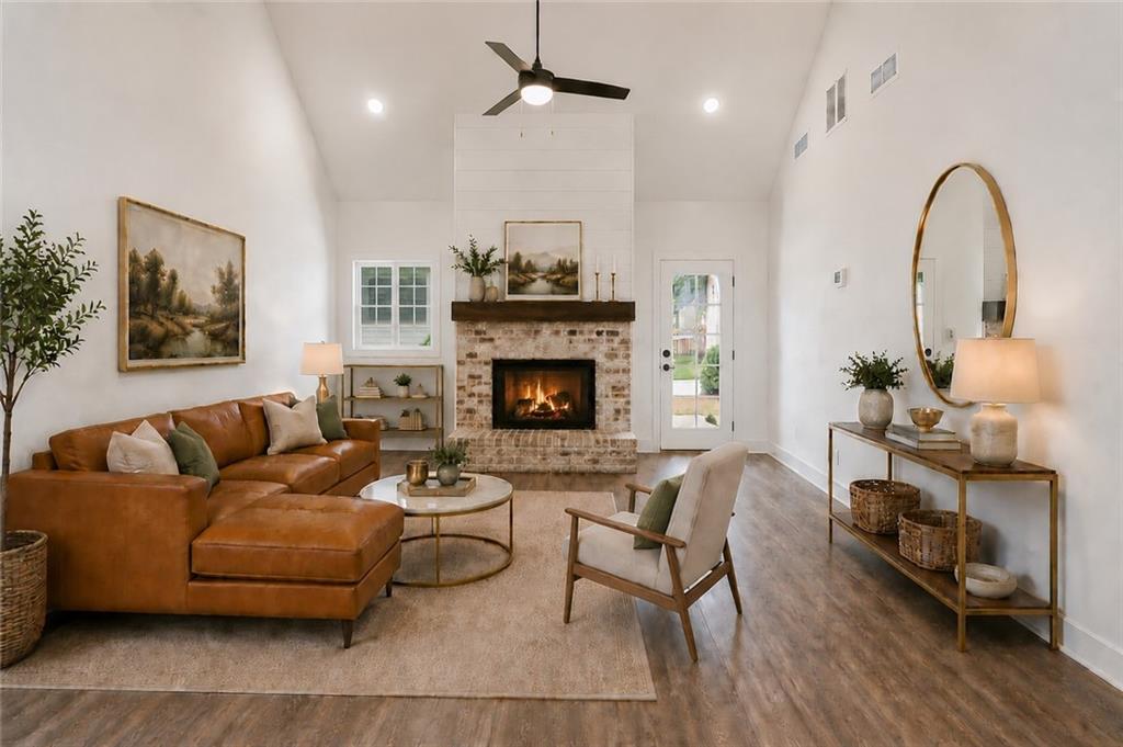 135 Old Alabama Road Southeast Emerson, GA 30137 - Photo 28 of 57 a living room with furniture and a fireplace