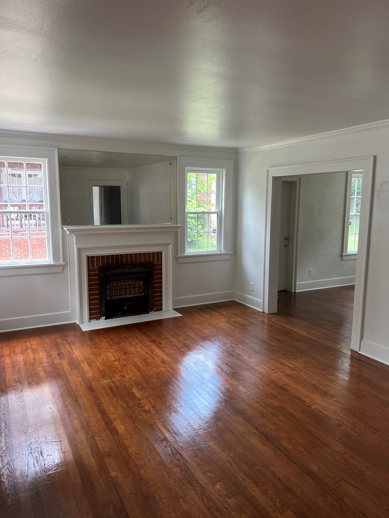 2211 8th Street Columbus, GA 31906 - Photo 3 of 16 living room with real hardwood floor and fireplace