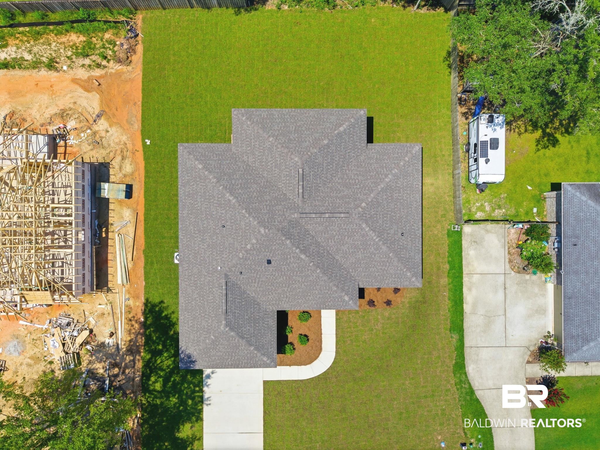 32656 Arbor Ridge Circle Lillian, AL 36549 - Photo 44 of 56 Expansive property with a well-maintained lawn and a newly installed asphalt shingle roof
