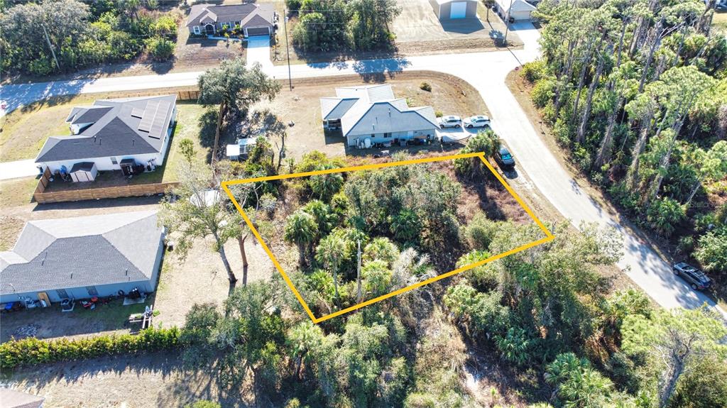 16 Caladium Road North Port, FL 34288 - Photo 3 of 23 an aerial view of a house with garden space and lake view