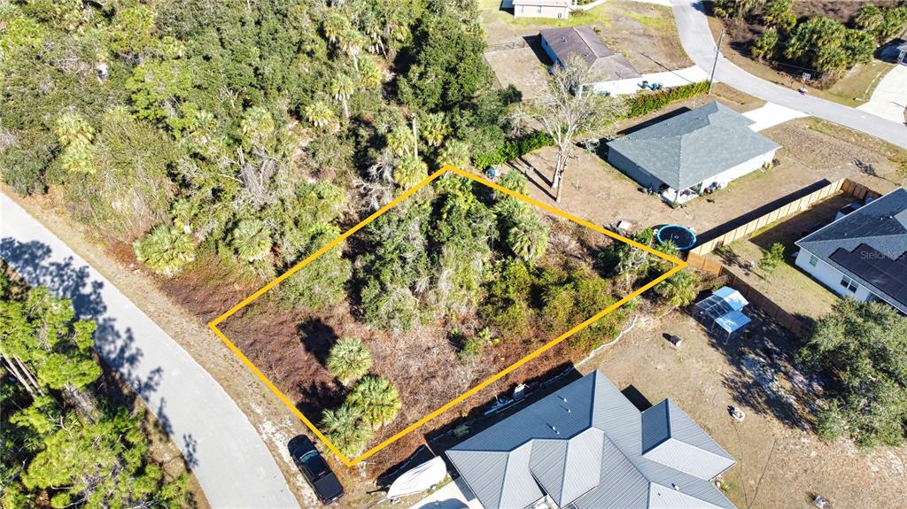 16 Caladium Road North Port, FL 34288 - Photo 9 of 23 an aerial view of a residential houses with yard