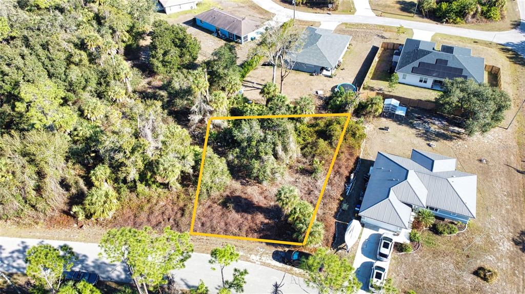 16 Caladium Road North Port, FL 34288 - Photo 10 of 23 an aerial view of a house with a yard and garden