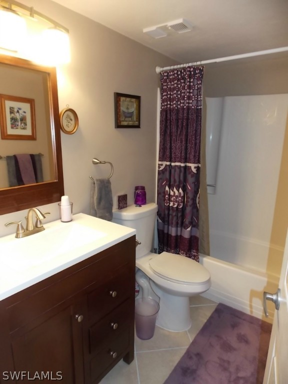 16881 Davis Road, Unit 813 Fort Myers, FL 33908 - Photo 17 of 25 a bathroom with a sink a toilet and shower