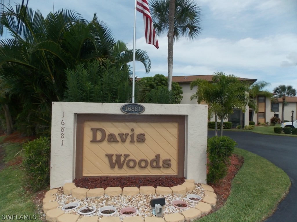 16881 Davis Road, Unit 813 Fort Myers, FL 33908 - Photo 25 of 25 a sign on the side of the road