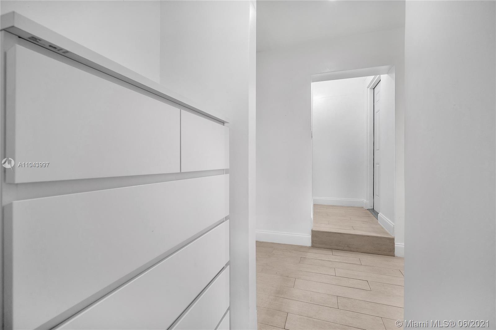 774 Fernwood Road Key Biscayne, FL 33149 - Photo 22 of 36 a view of an empty walk in closet