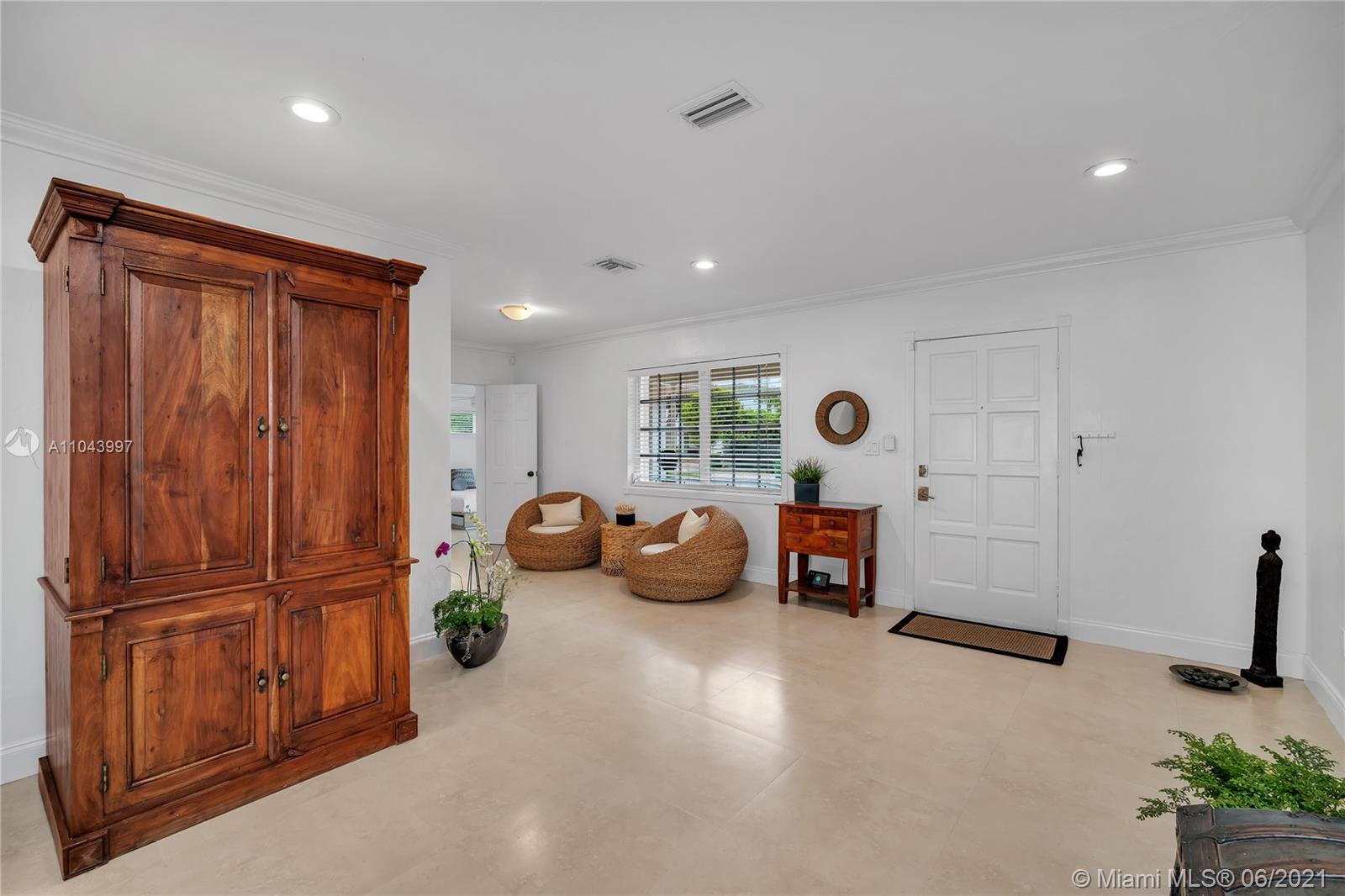 774 Fernwood Road Key Biscayne, FL 33149 - Photo 5 of 36 a view of game room with window