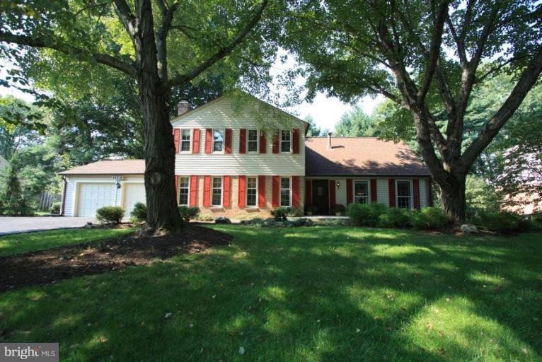 14108 Ansted Road Silver Spring, MD 20905 - Photo 1 of 24 a front view of a house with a garden