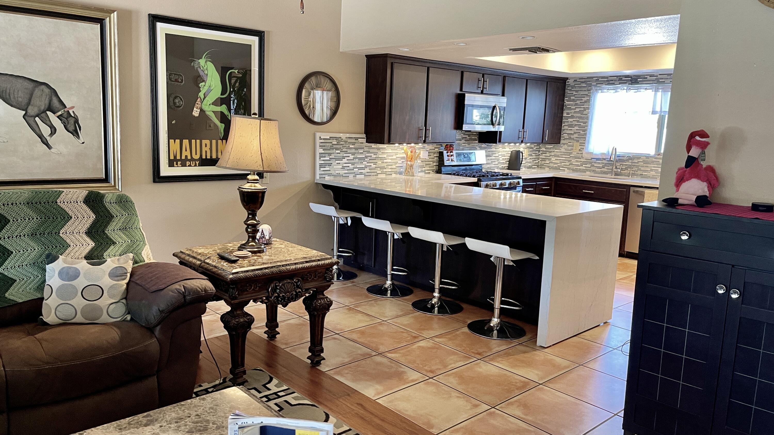 2775 East Verona Road Palm Springs, CA 92262 - Photo 4 of 10 a living room with furniture and window
