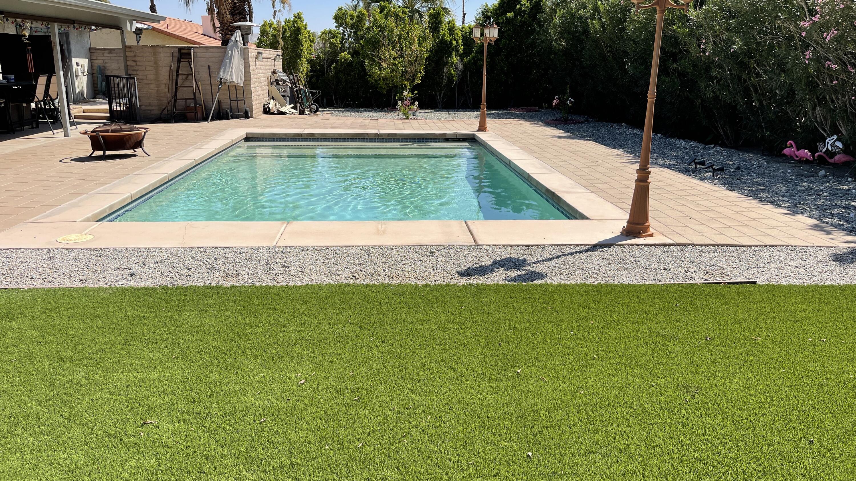 2775 East Verona Road Palm Springs, CA 92262 - Photo 5 of 10 a swimming pool with barbeque oven and outdoor seating