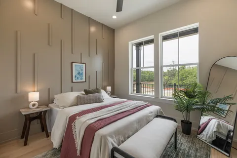 a bathroom with 2 sink tub and a mirror