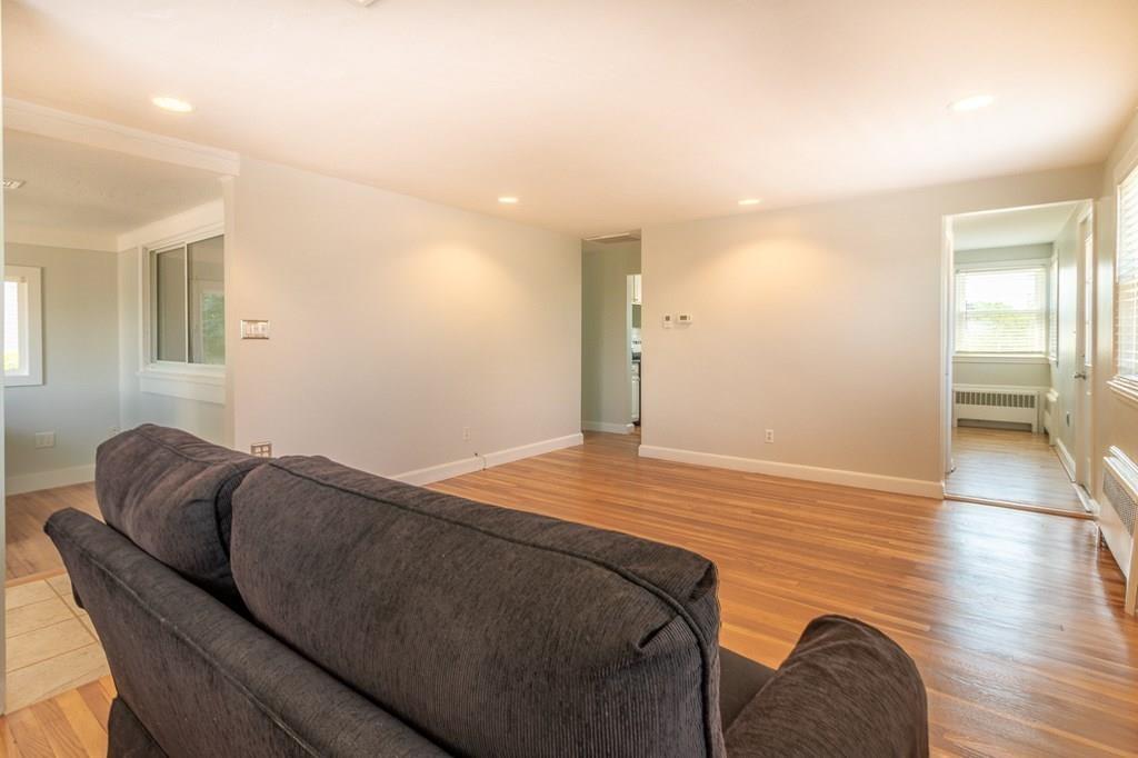 34 Brookline Avenue Hull, MA 02045 - Photo 11 of 40 a bedroom with a bed and couch