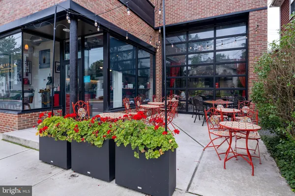 a view of a chairs and table in a patio