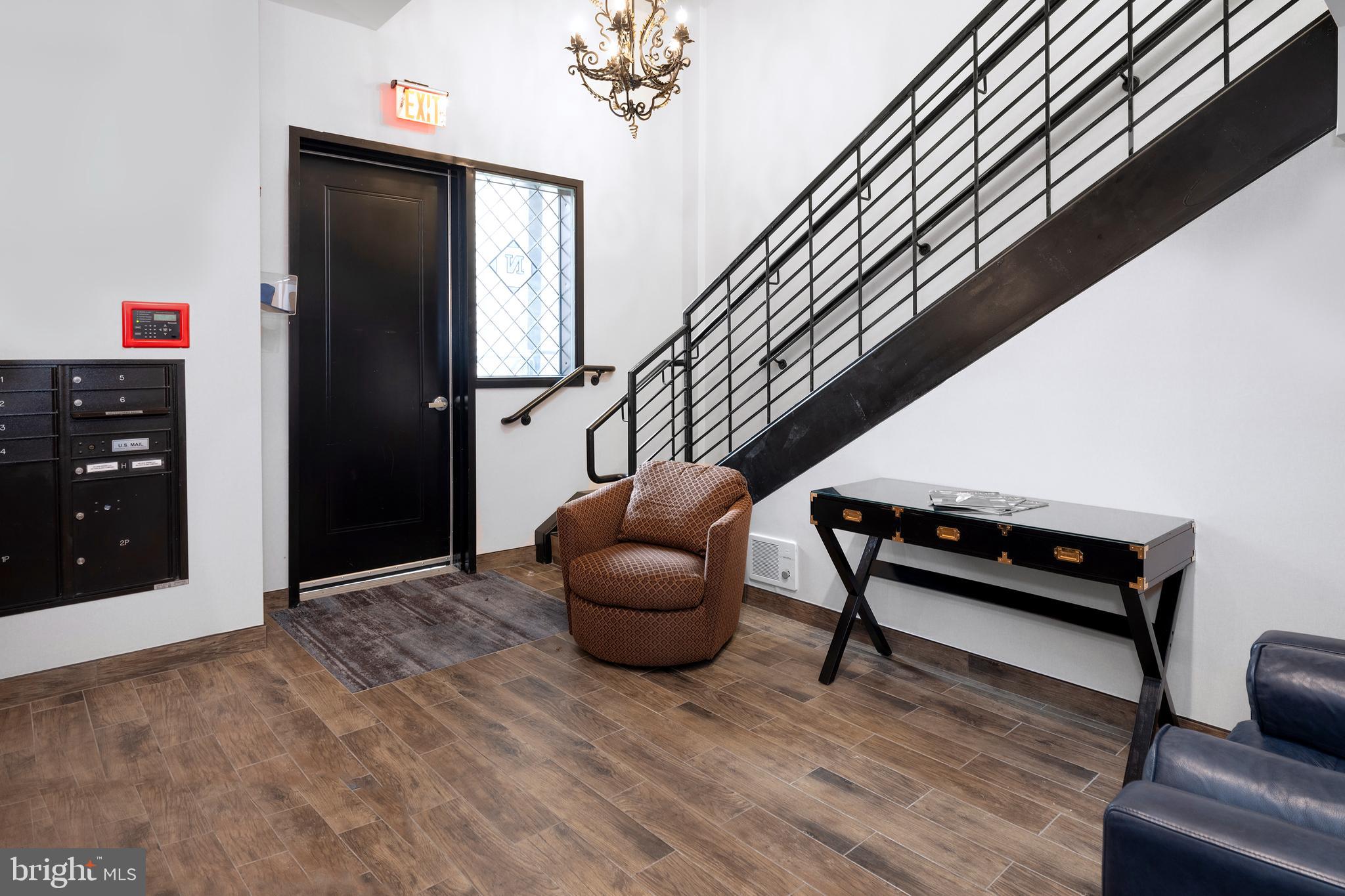 45 Spring Street, Unit 5 Princeton, NJ 08542 - Photo 3 of 17 a hallway with furniture and a rug
