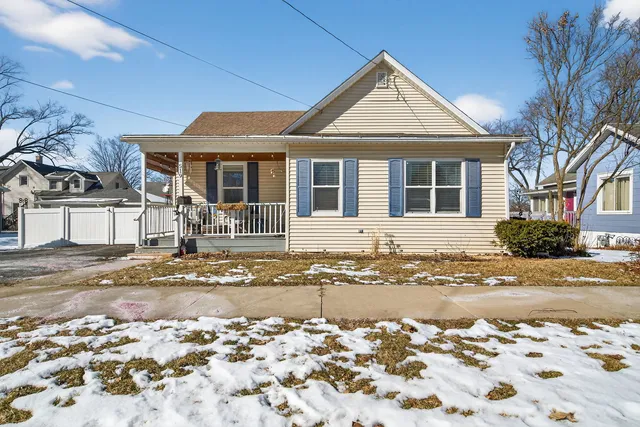 a front view of a house with a empty space