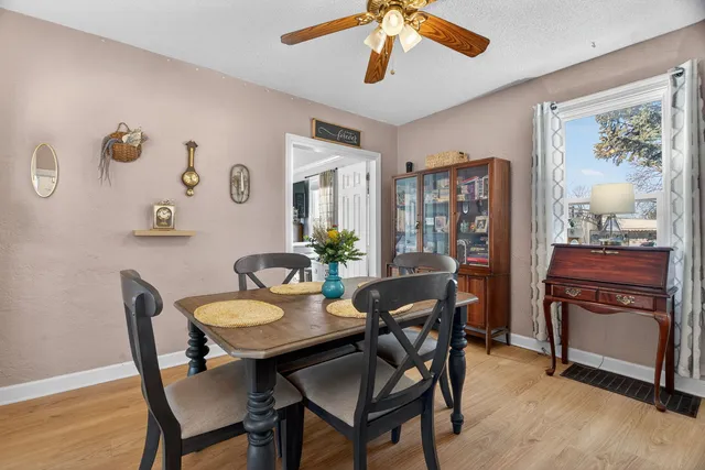 a view of a dining room with furniture