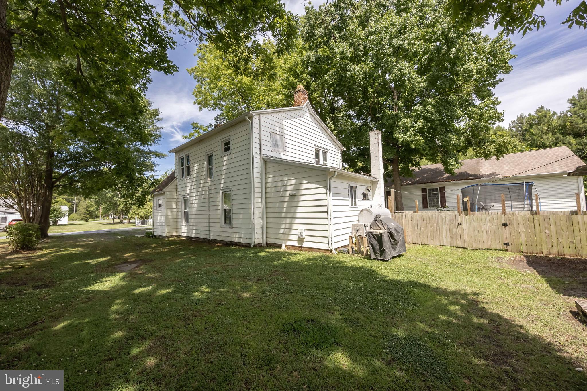 26467 Mariners Road Crisfield, MD 21817 - Photo 7 of 44 a view of a house with a yard