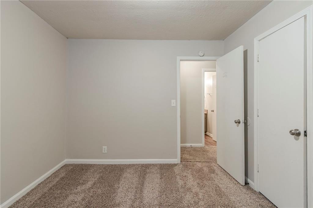 2045 Scarbrough Drive Stone Mountain, GA 30088 - Photo 16 of 26 a view of an empty room