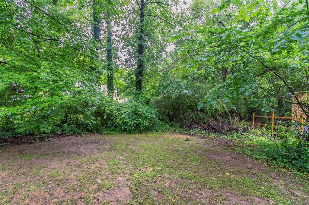 2045 Scarbrough Drive Stone Mountain, GA 30088 - Photo 26 of 26 a view of a forest with trees in the background