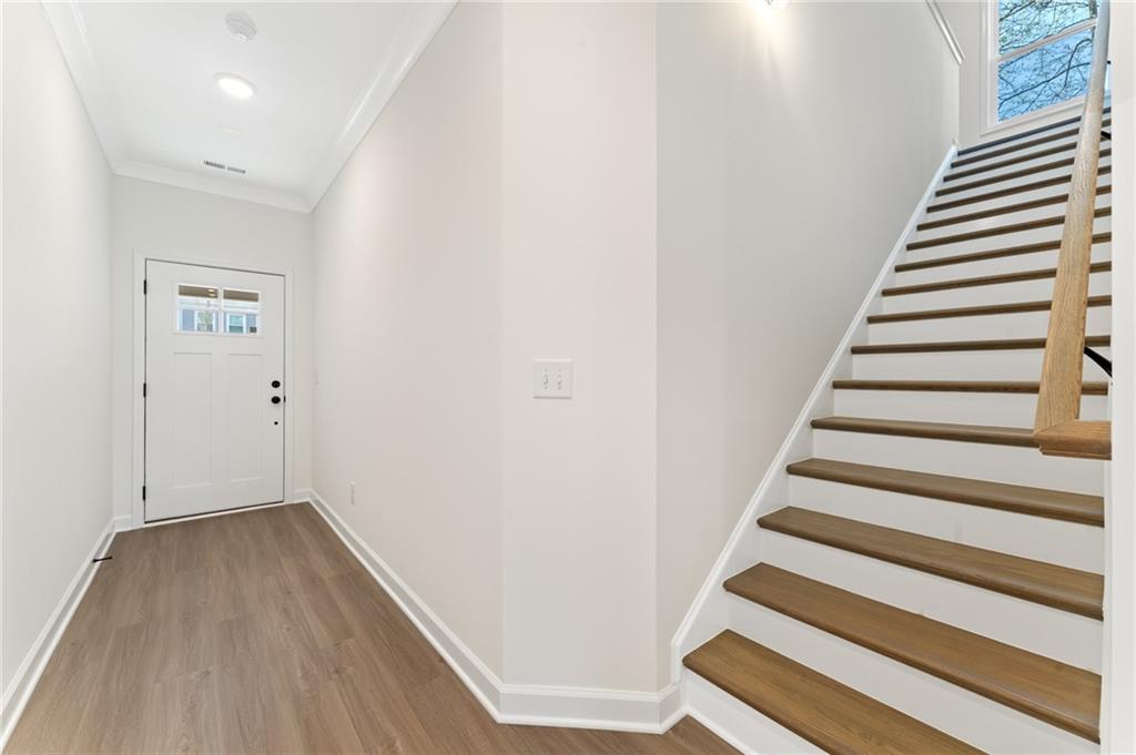 325 Colsen Drive Acworth, GA 30102 - Photo 4 of 25 a view of entryway with wooden floor
