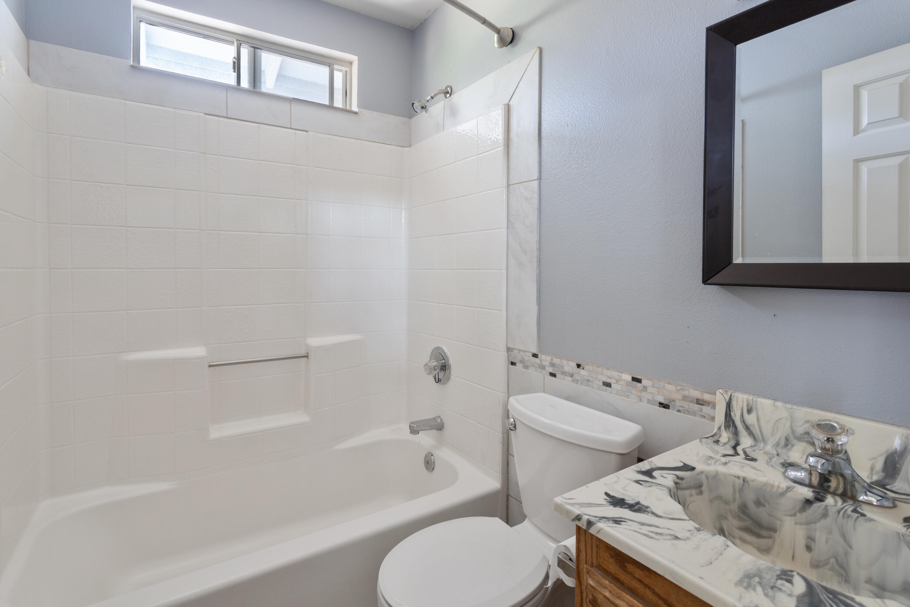 12656 Shalon Drive Redding, CA 96003 - Photo 13 of 21 a bathroom with a sink toilet and shower