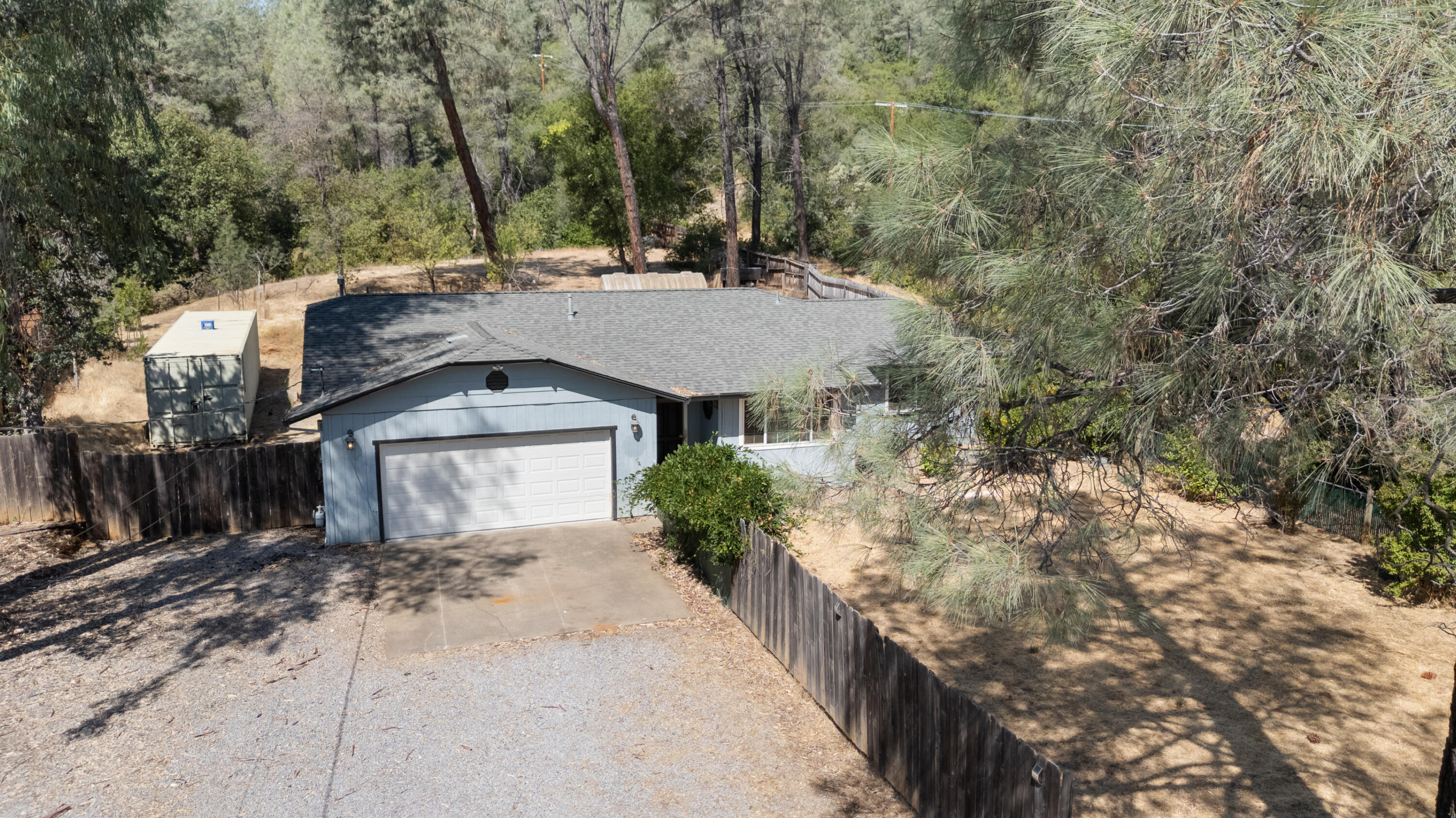12656 Shalon Drive Redding, CA 96003 - Photo 21 of 21 a view of a house with a yard and large tree
