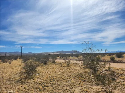 a view of lake with mountain