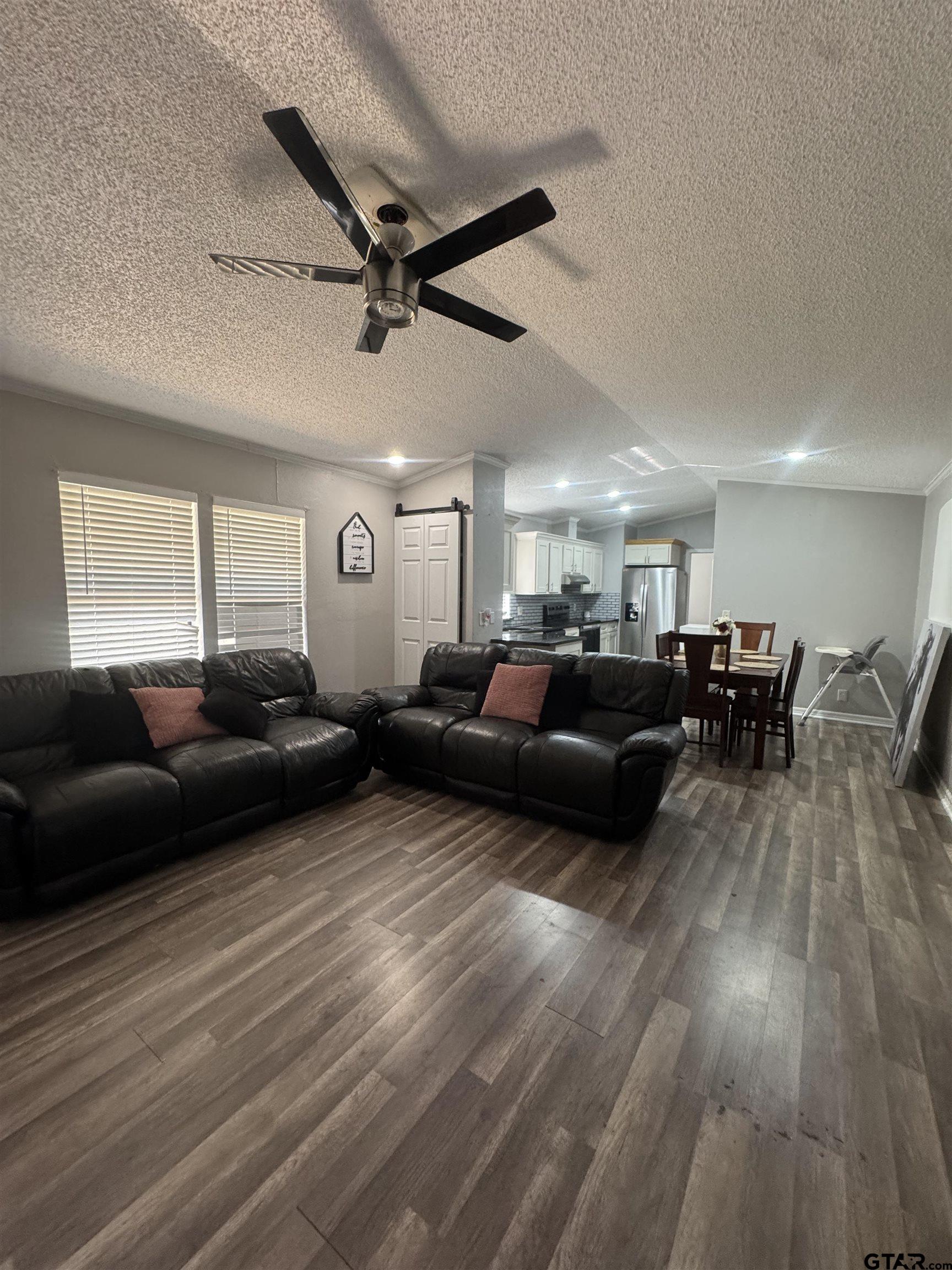 8261 County Road 381 Tyler, TX 75708 - Photo 14 of 24 a living room with furniture