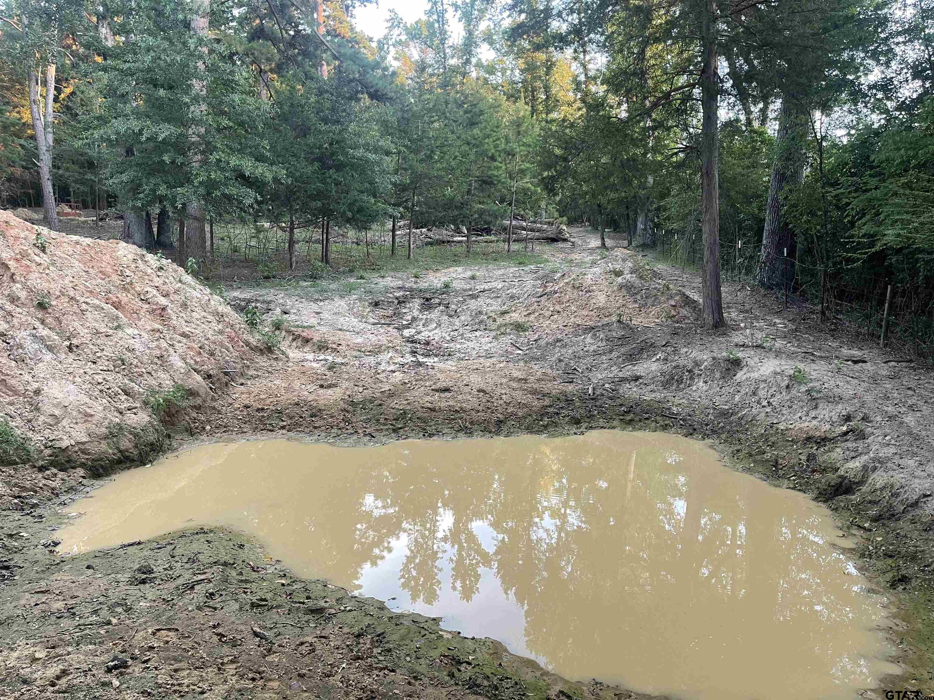 8261 County Road 381 Tyler, TX 75708 - Photo 17 of 24 a view of a yard with wooden fence