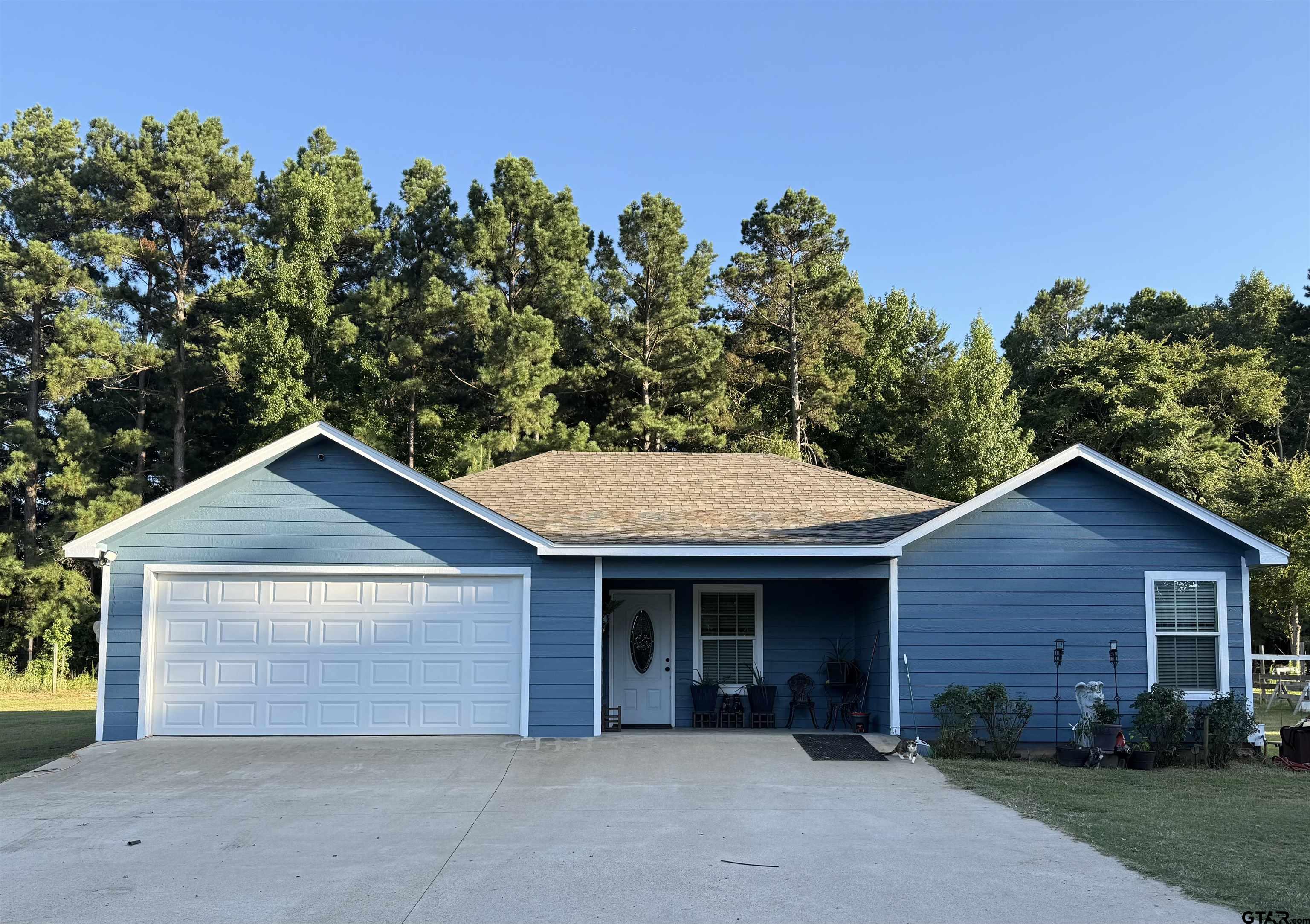 8261 County Road 381 Tyler, TX 75708 - Photo 2 of 24 front view of a house with a yard