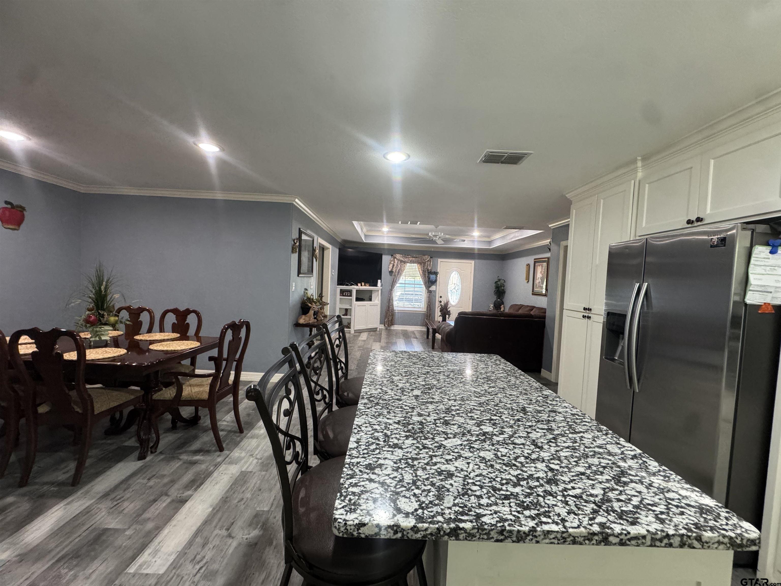 8261 County Road 381 Tyler, TX 75708 - Photo 6 of 24 a view of a dining room with furniture