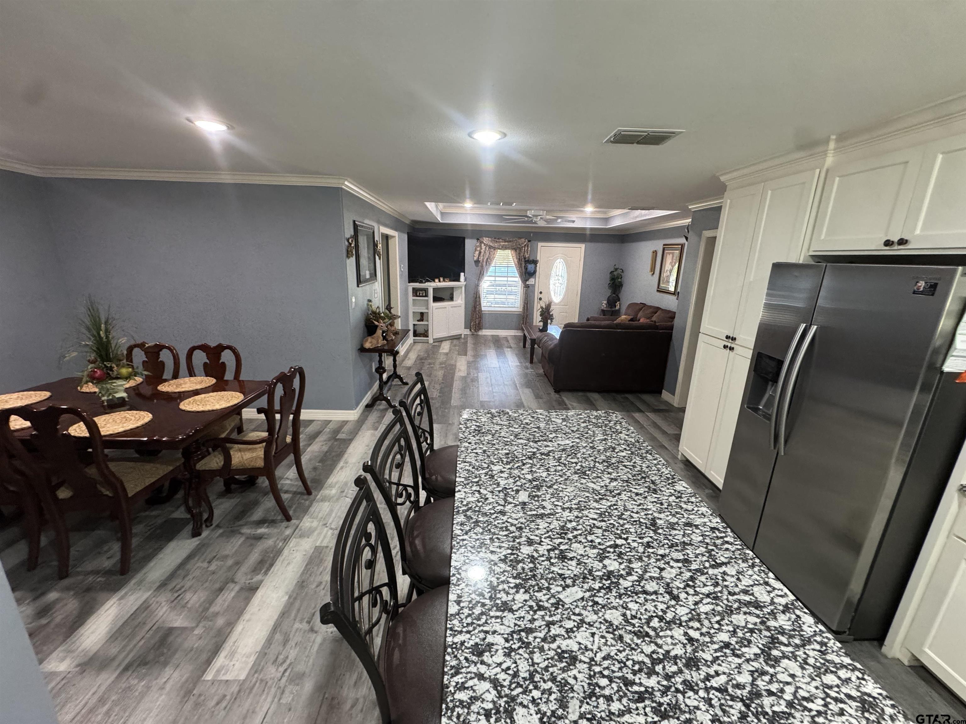 8261 County Road 381 Tyler, TX 75708 - Photo 8 of 24 a view of a hallway with furniture