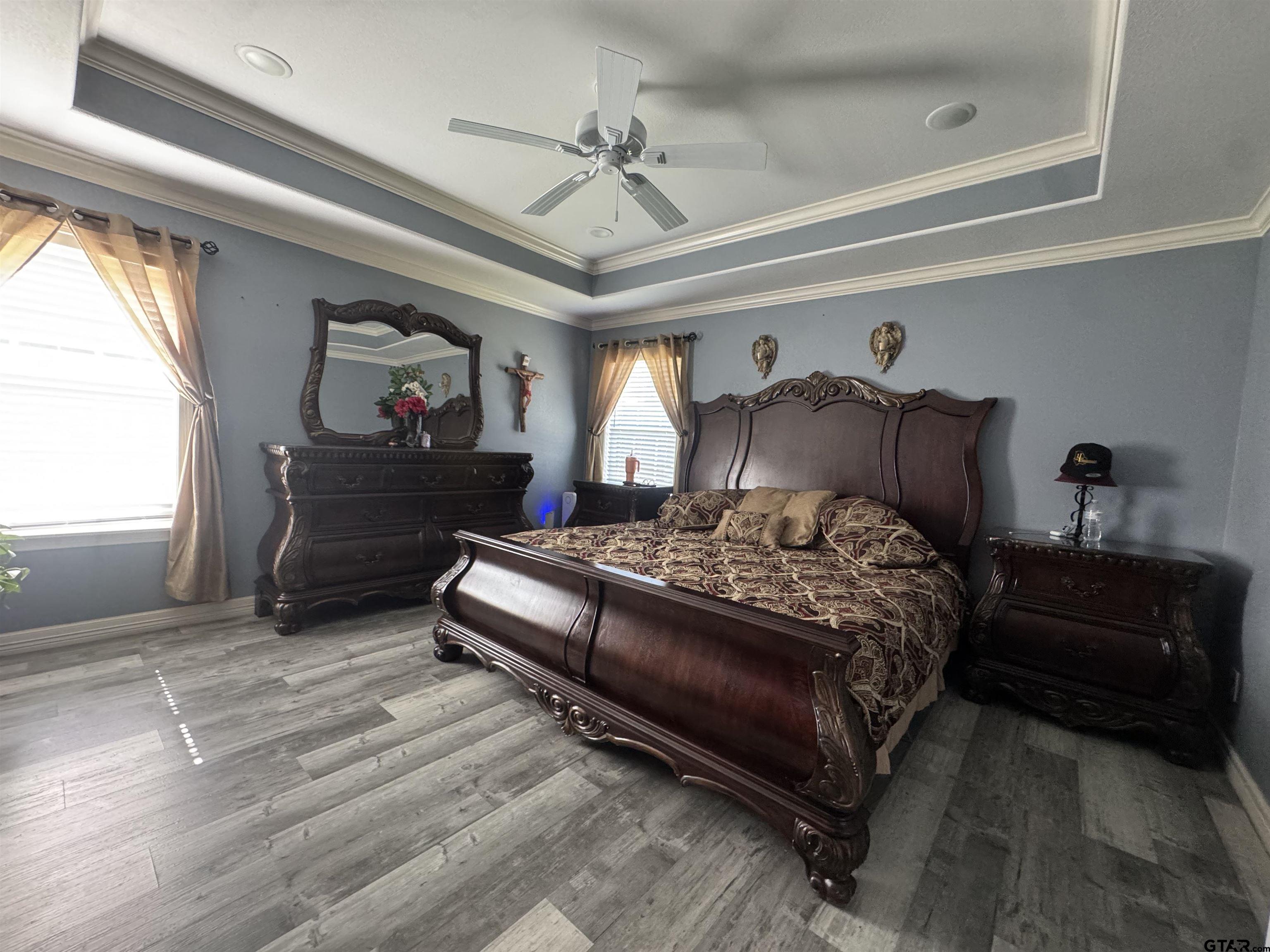 8261 County Road 381 Tyler, TX 75708 - Photo 9 of 24 a bedroom with a bed and window