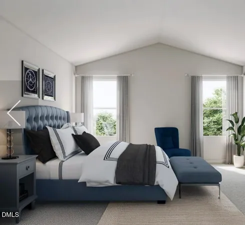 a bedroom with bed and window