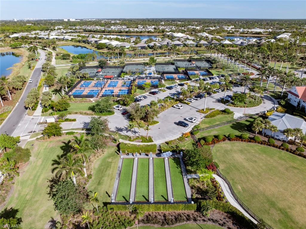 5716 Highbourne Drive Naples, FL 34113 - Photo 32 of 36 an aerial view of residential houses with outdoor space