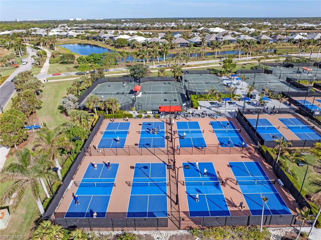 5716 Highbourne Drive Naples, FL 34113 - Photo 34 of 36 an aerial view of a houses