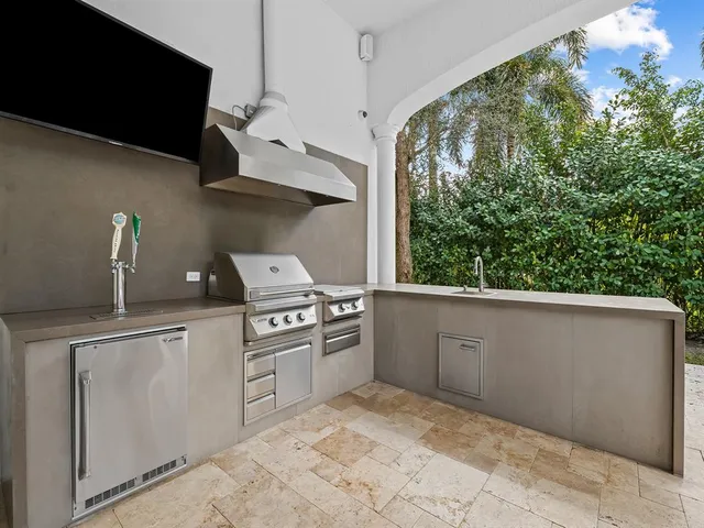 a spacious bathroom with a tub sink and mirror