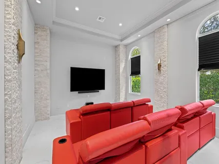 an aerial view of residential houses with outdoor space and street view