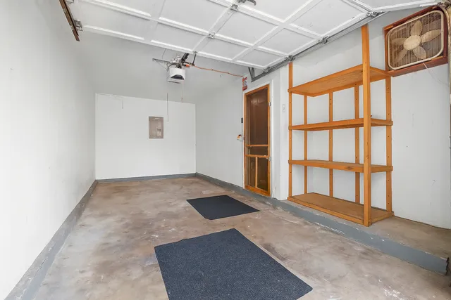 a view of a backyard with a small cabin