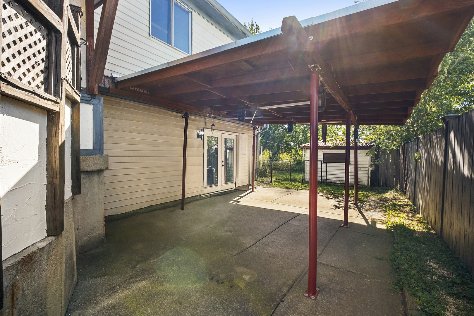 545 Old Stone Road Bolingbrook, IL 60440 - Photo 15 of 28 a view of a backyard with a small cabin