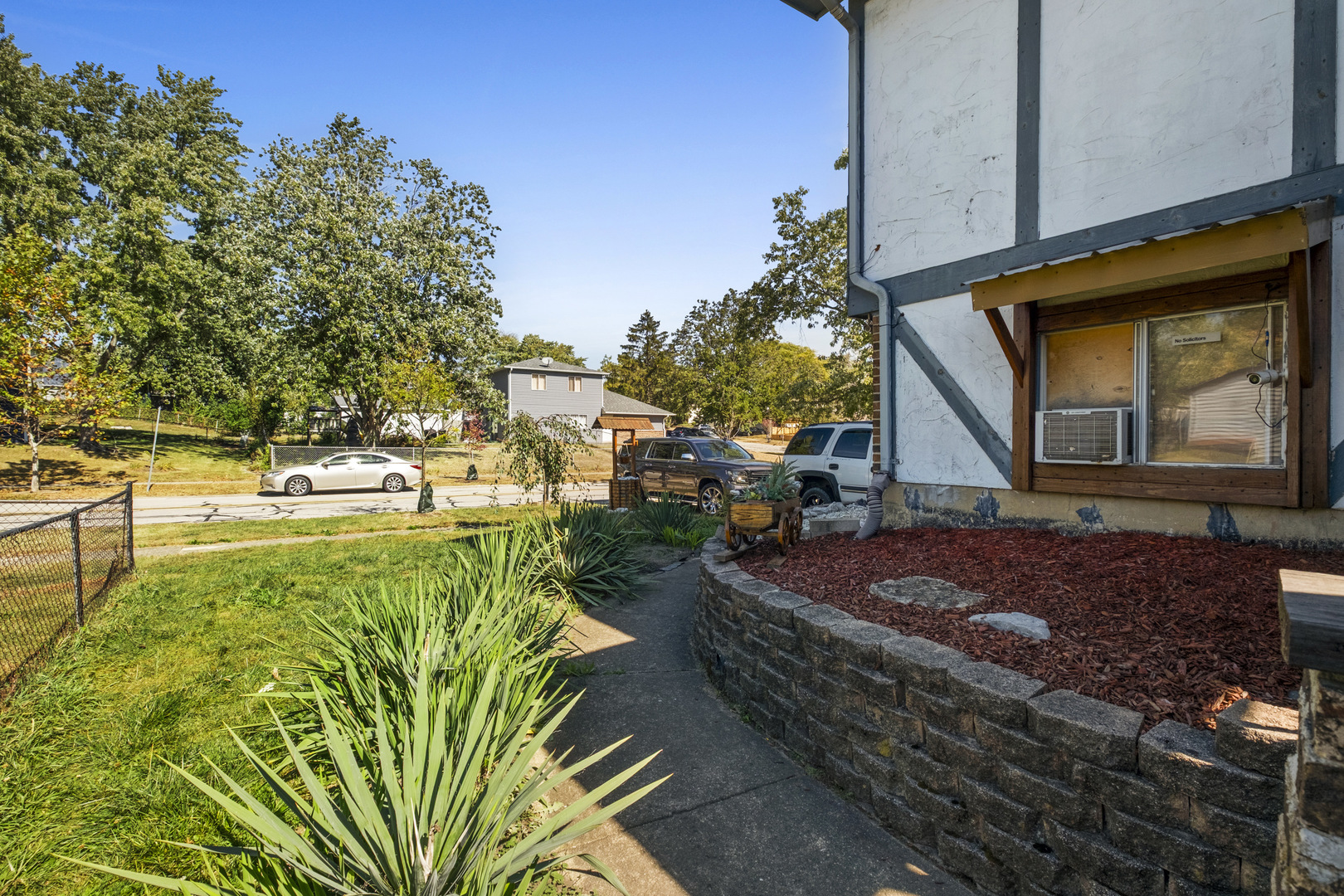 545 Old Stone Road Bolingbrook, IL 60440 - Photo 17 of 28 a view of a house with a yard