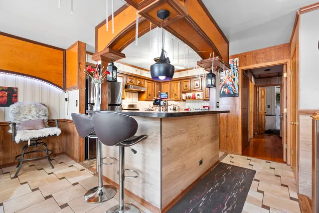a view of a living room and bathroom