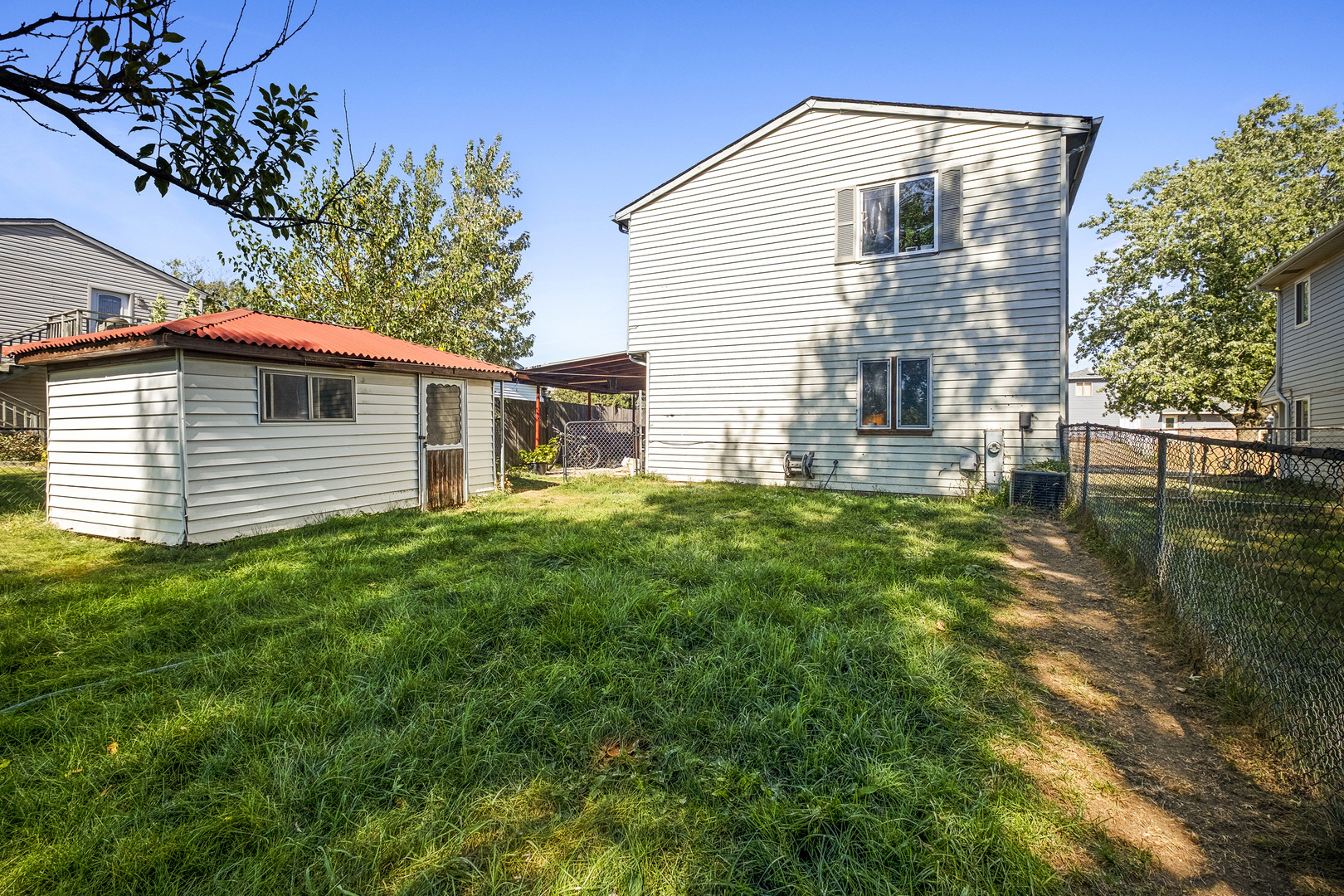 545 Old Stone Road Bolingbrook, IL 60440 - Photo 22 of 28 a front view of house with yard and outdoor seating