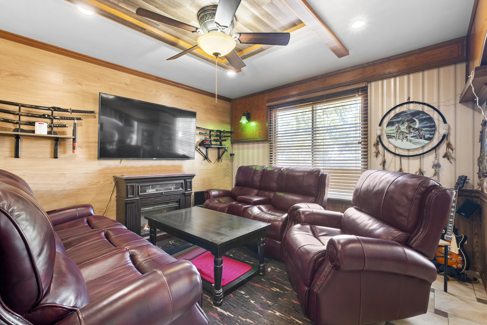 545 Old Stone Road Bolingbrook, IL 60440 - Photo 8 of 28 a living room with furniture a flat screen tv and a window