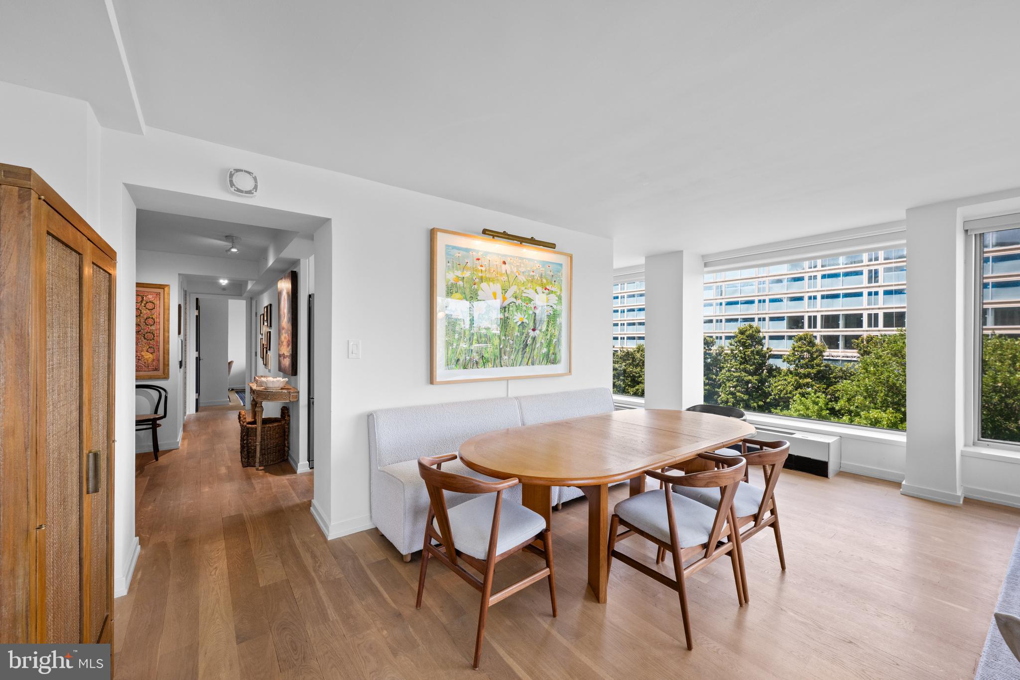 1101 3rd Street Southwest, Unit 315 Washington, DC 20024 - Photo 17 of 38 a view of a dining room with furniture and wooden floor