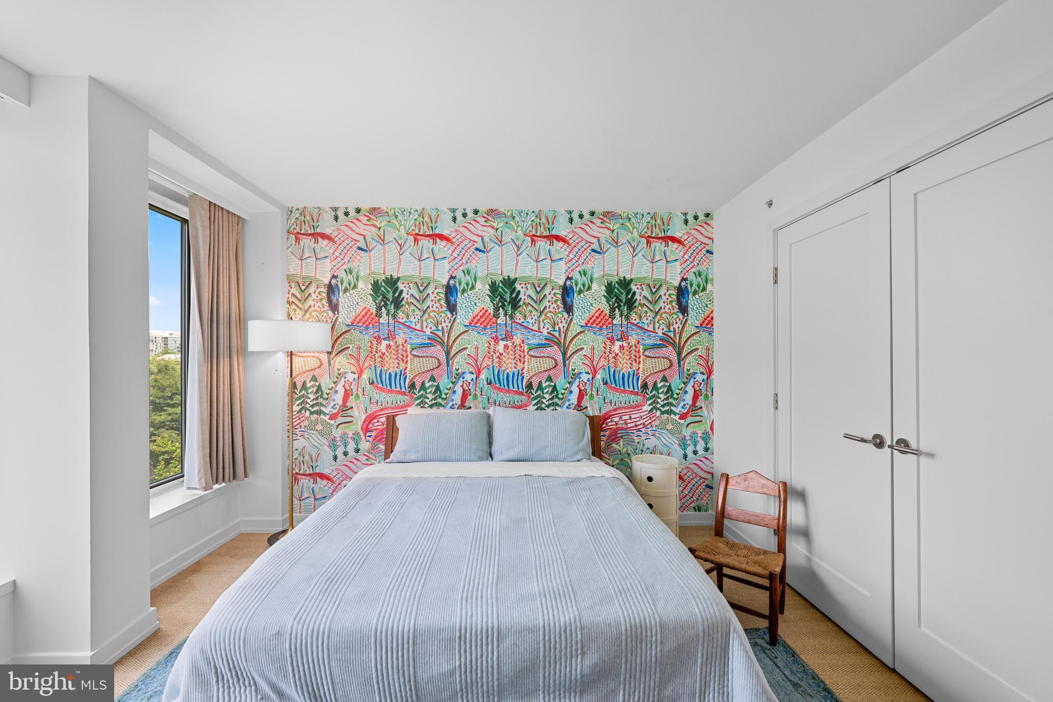 1101 3rd Street Southwest, Unit 315 Washington, DC 20024 - Photo 27 of 38 a bed room with furniture and a window