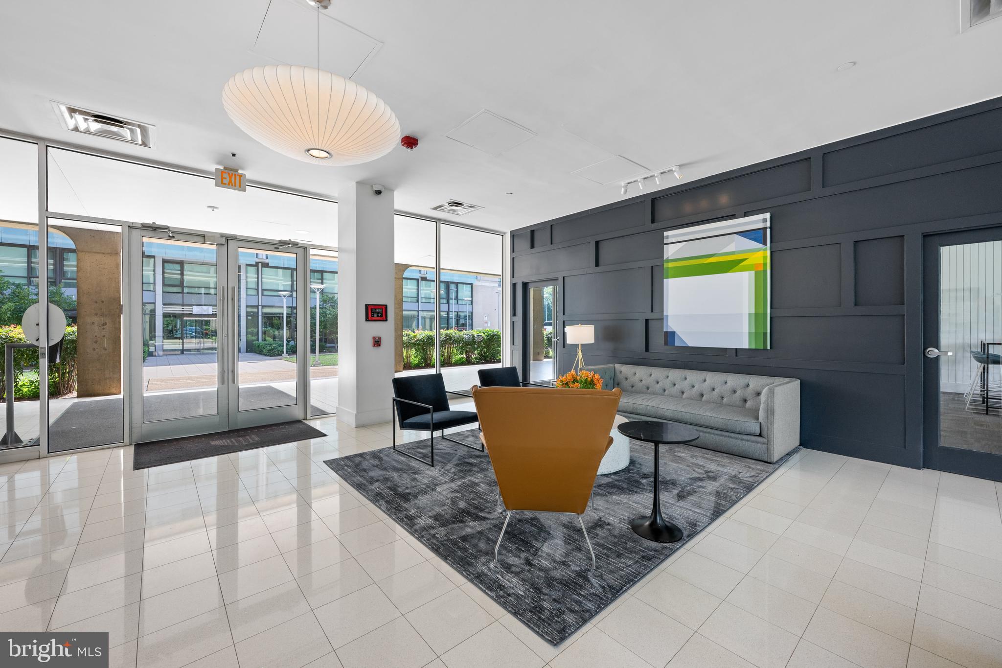 1101 3rd Street Southwest, Unit 315 Washington, DC 20024 - Photo 32 of 38 a living room filled with furniture