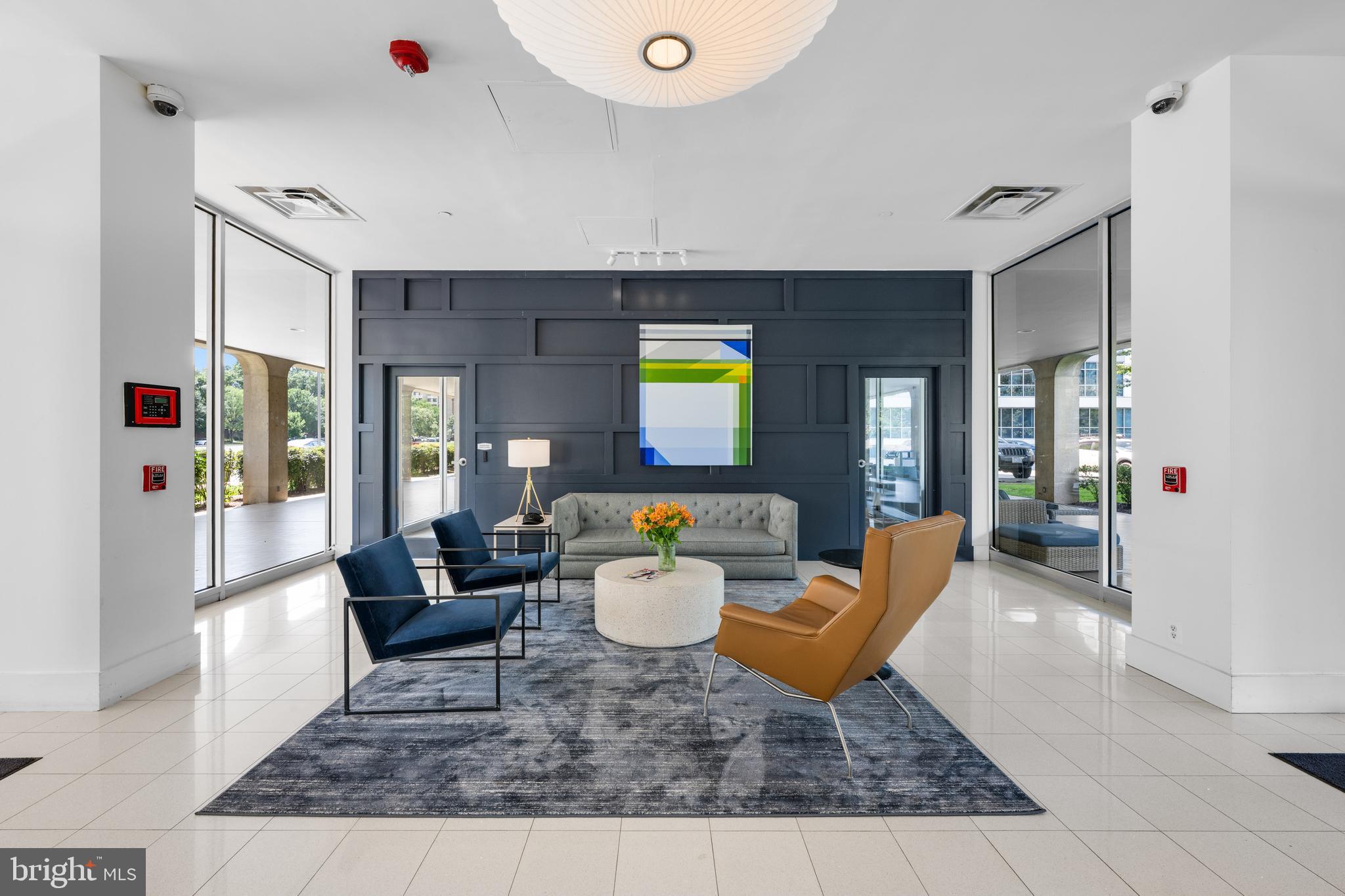 1101 3rd Street Southwest, Unit 315 Washington, DC 20024 - Photo 33 of 38 a living room with furniture and wooden floor