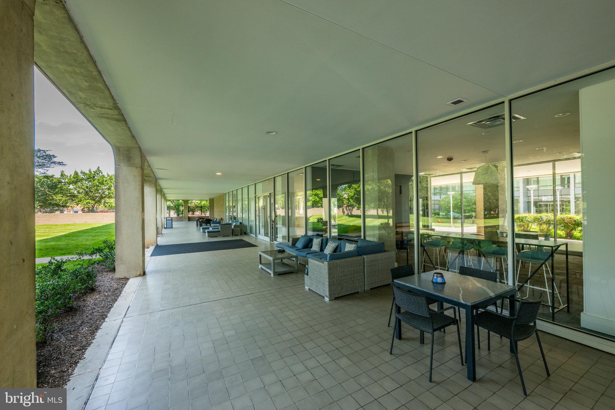 1101 3rd Street Southwest, Unit 315 Washington, DC 20024 - Photo 34 of 38 a view of a porch with furniture and garden